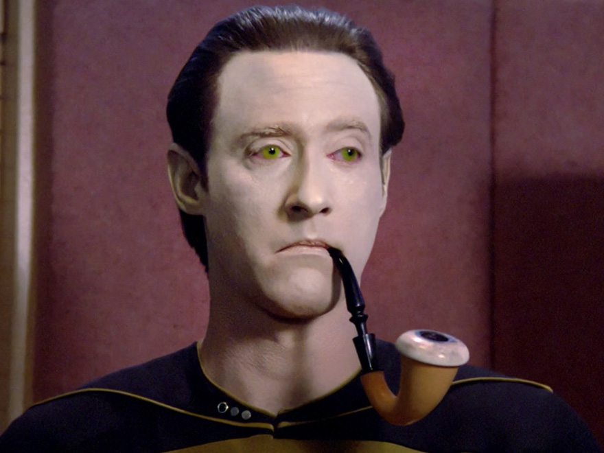 An image of the Star Trek character Data, smoking a pipe